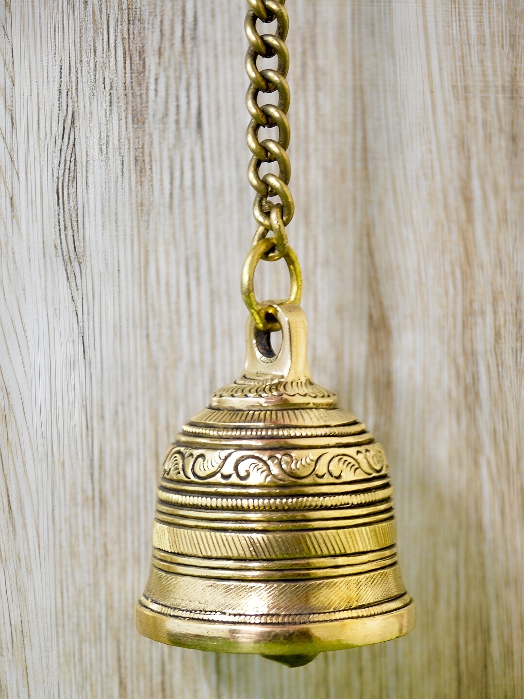 

Aakrati Gold Toned Textured Brass Hanging Pooja Bell With Chain