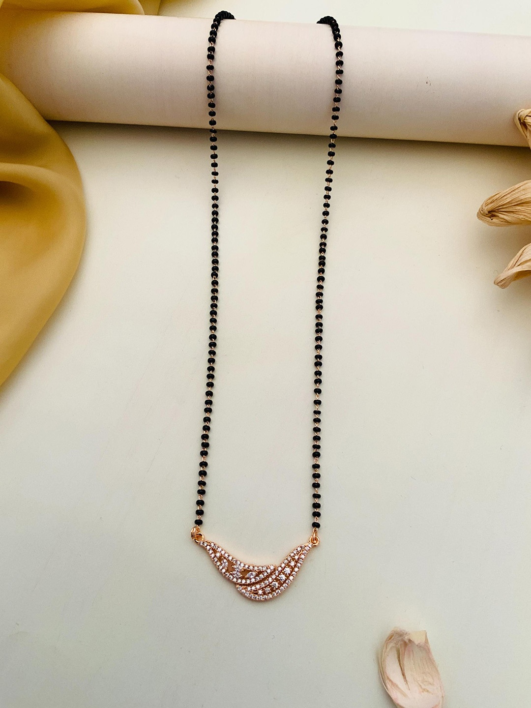 

Anouk Rose Gold-Plated American Diamond-Studded & Beaded Mangalsutra