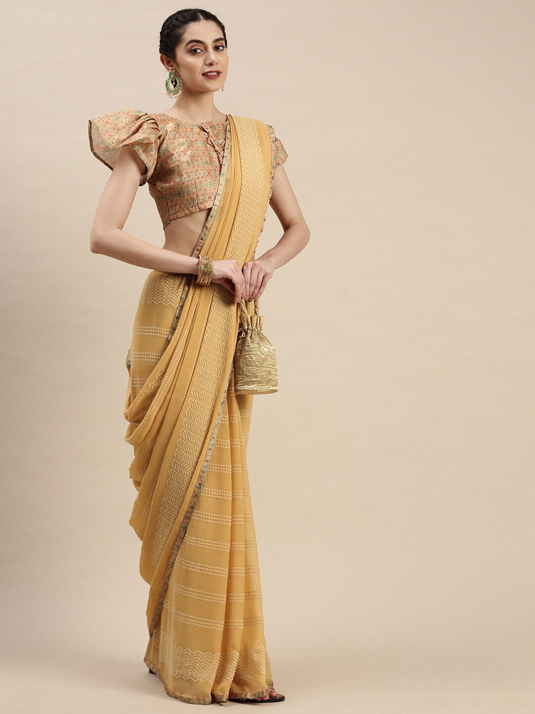 

Sunasi Ethnic Motifs Embroidered Pure Georgette Saree, Mustard