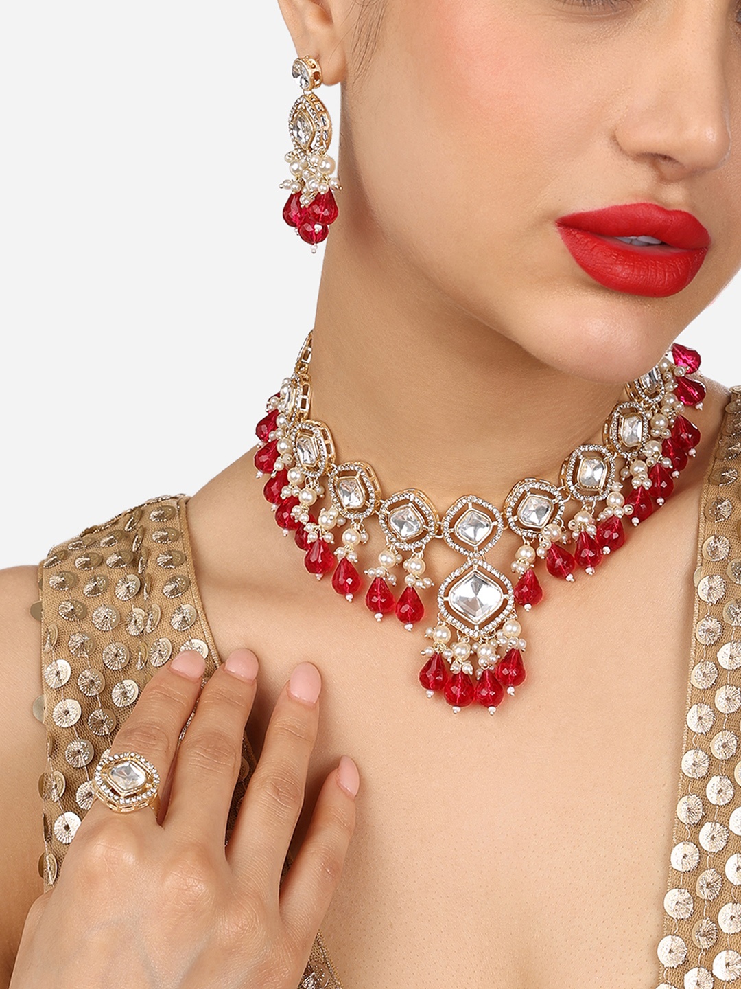 

Zaveri Pearls Gold-Plated Stone Studded & Beaded Jewellery Set