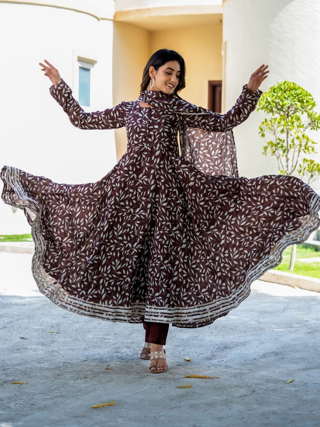 

HOUSE OF JAMOTI Floral Printed Flared Anarkali Kurta With Trousers & Dupatta, Brown