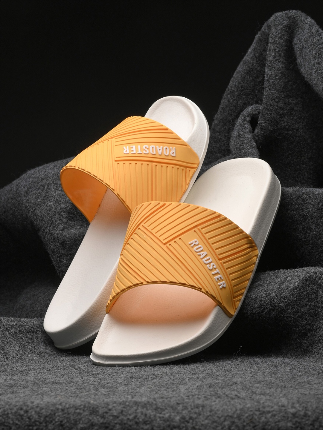 

The Roadster Lifestyle Co. Men yellow Textured Slip-On Sliders