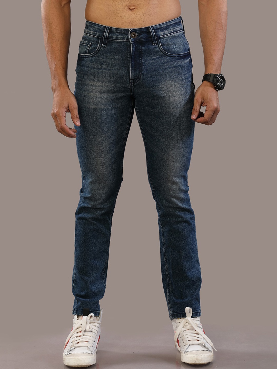 

The Roadster Lifestyle Co. Blue Men Comfort Slim Fit Light Fade Stretchable Jeans