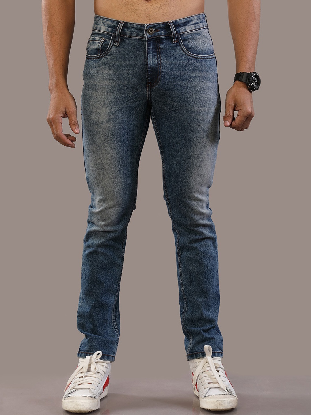 

The Roadster Lifestyle Co. Blue Men Comfort Slim Fit Heavy Fade Stretchable Jeans