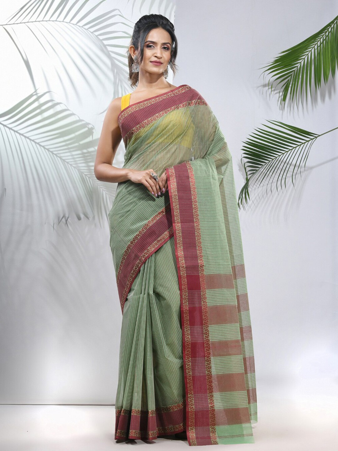 

Charukriti Striped Woven Design Pure Cotton Taant Saree, Green