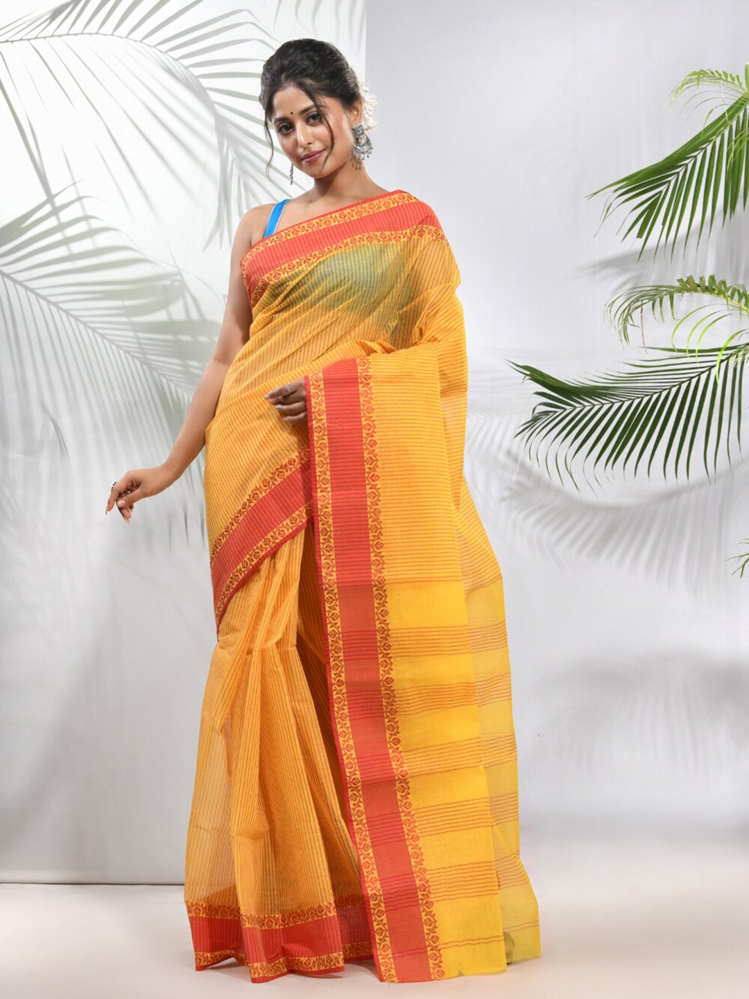 

Charukriti Striped Woven Design Pure Cotton Taant Saree, Yellow