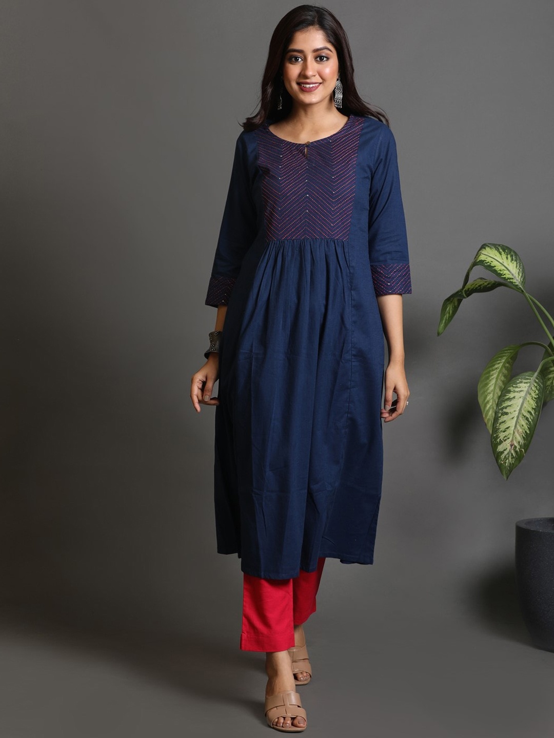 

Earthwear Women Yoke Design Flared Sleeves Thread Work Kurta, Navy blue