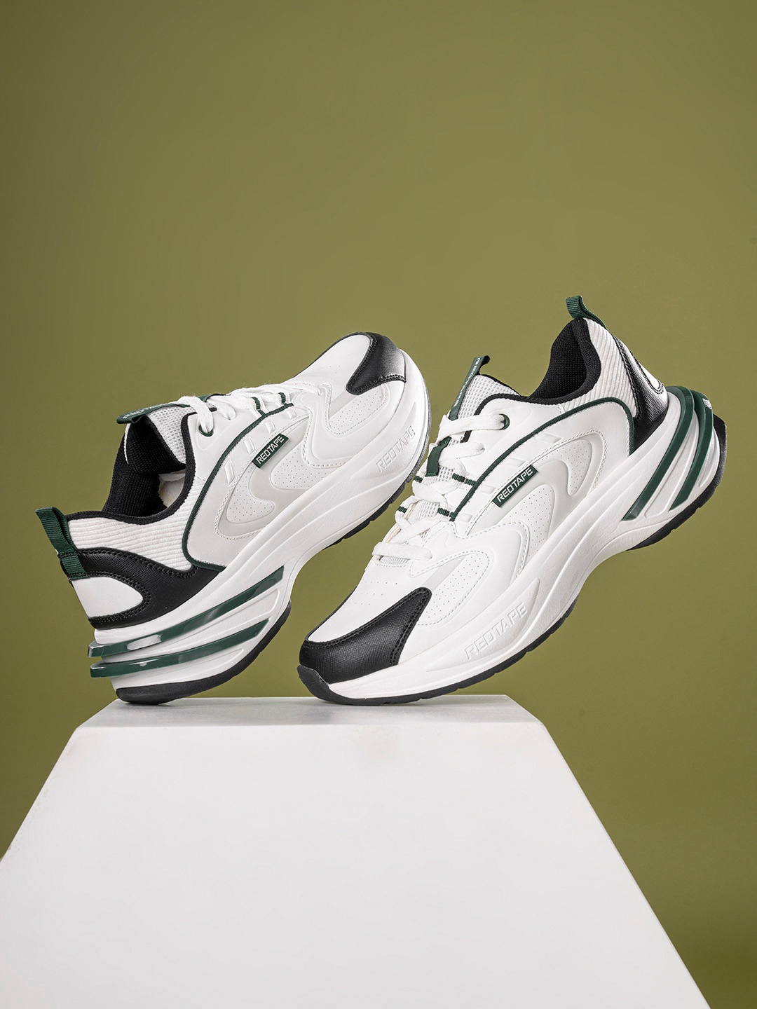 

Red Tape Men Solid Sneakers, Green