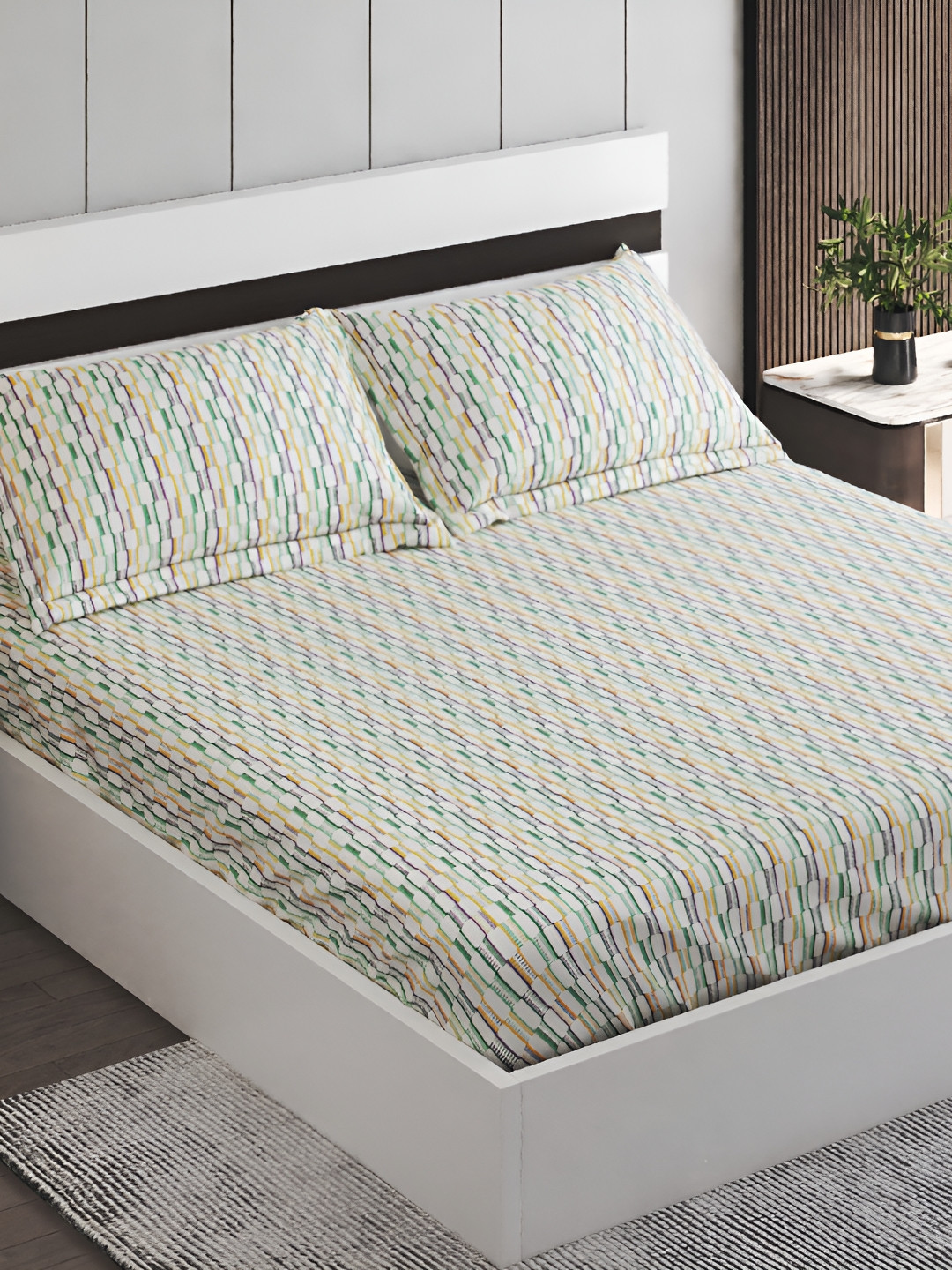 

Home Centre Off White & Green Geometric Cotton 144 TC King Bedsheet with 2 Pillow Covers