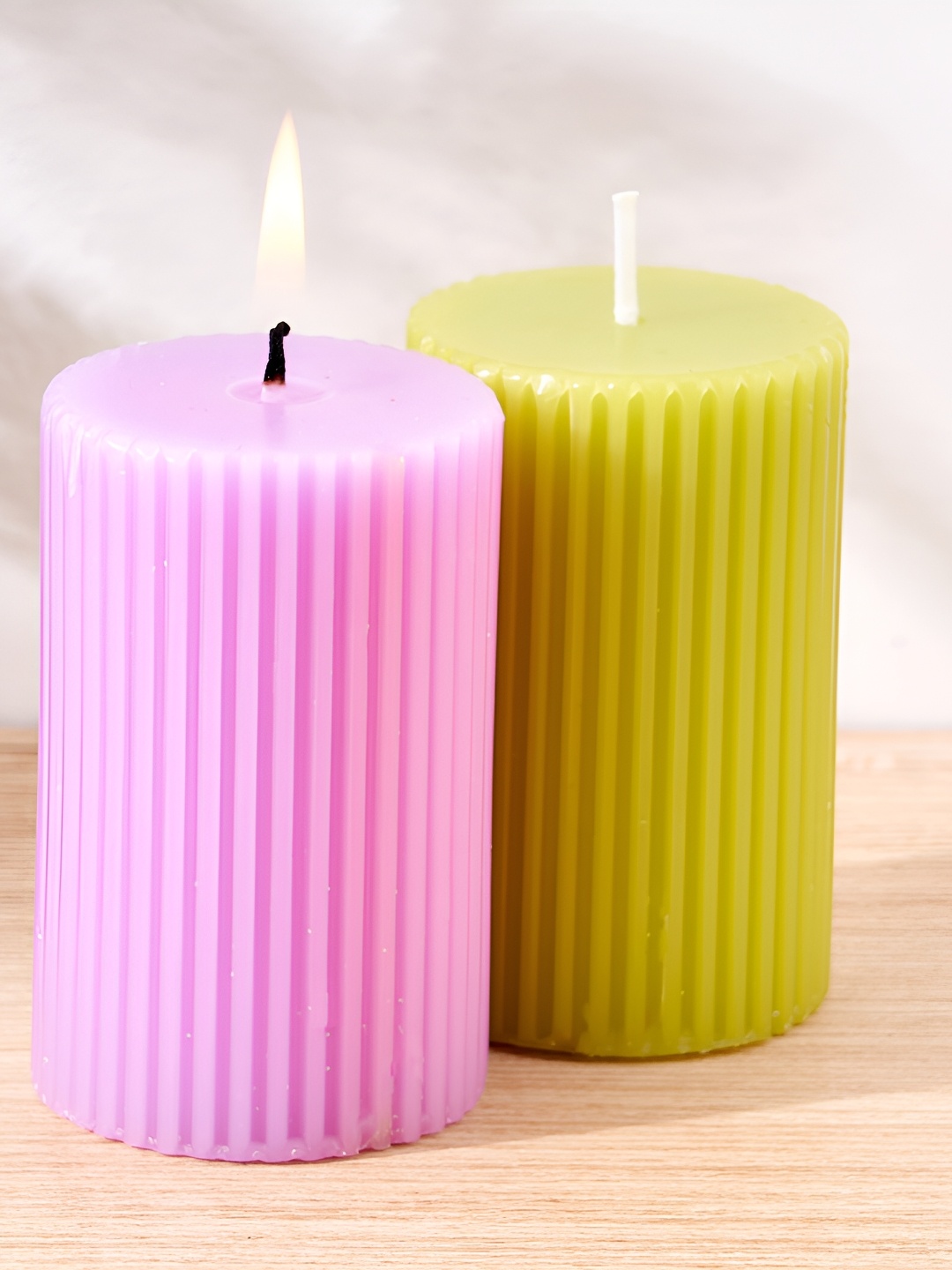 

Home Centre Green & Pink 2 pieces Jasmine and Lavender Scented Pillar Candles
