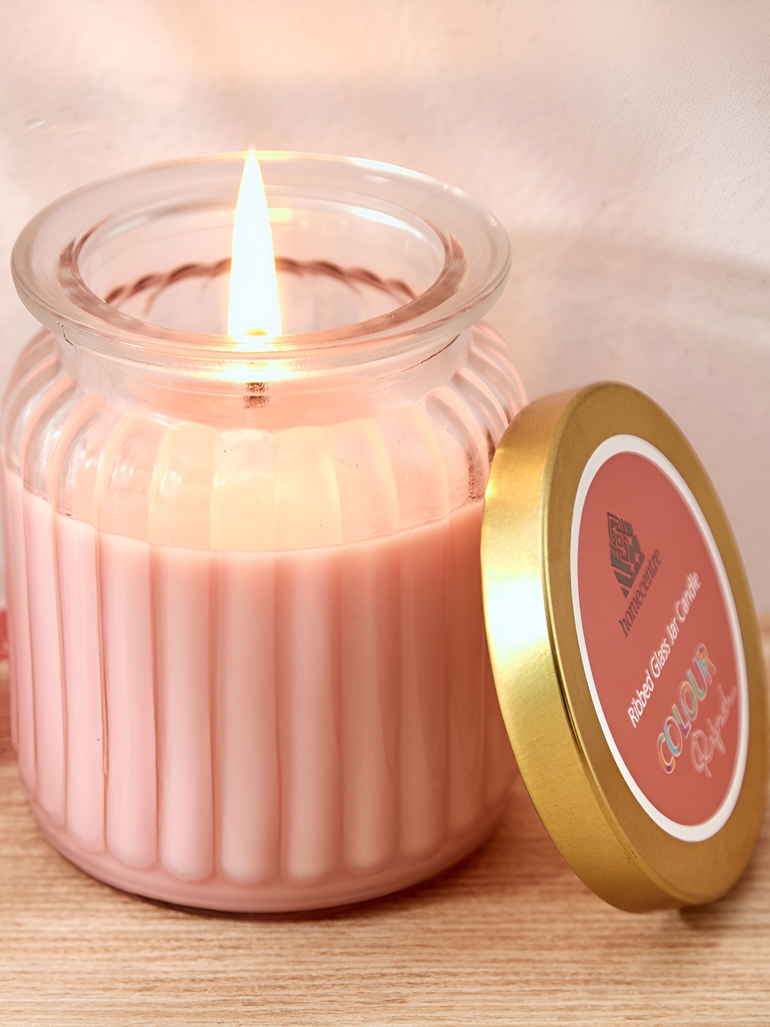 

Home Centre Pink Scented Ribbed Jar Candle