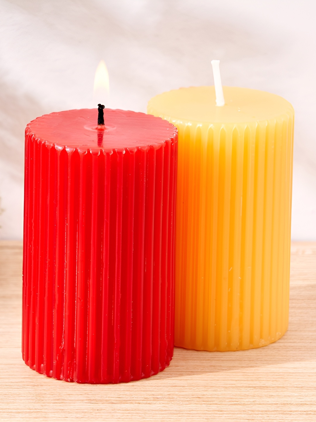 

Home Centre Red & Yellow 2 Pieces Lemongrass and Cranberry Scented Pillar Candles