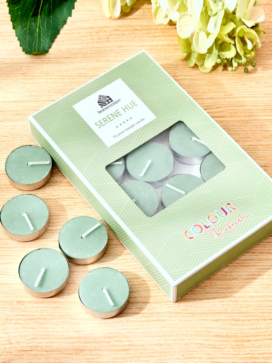 

Home Centre Green 25 Pieces Sea Breeze Scented T-light Candles