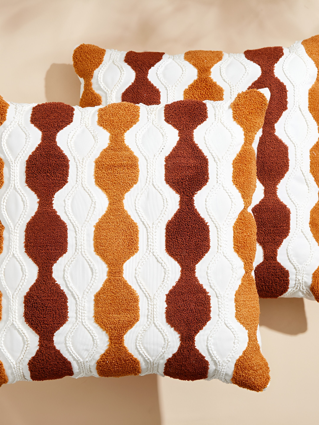 

Home Centre Brown & White 2 Pieces Geometric Square Cushion Covers