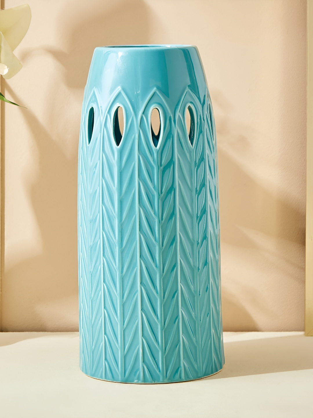 

Home Centre Rylee Ivana Teal-Blue Textured Ceramic Vase