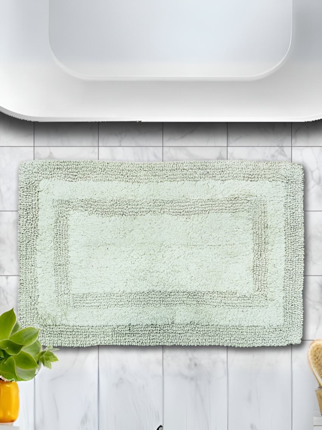 

Aurave Green Textured 2800 GSM Cotton Reversible Bath Mat