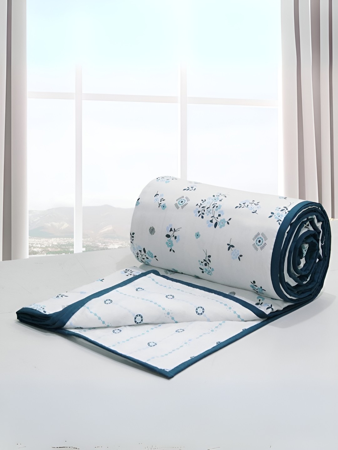 

Aurave Blue & White Floral AC Room 150 GSM Double Bed Dohar