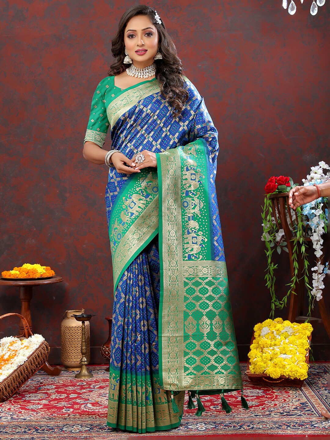

Mitera Ethnic Motifs Zari Woven Design Patola Saree with Tassels, Turquoise blue