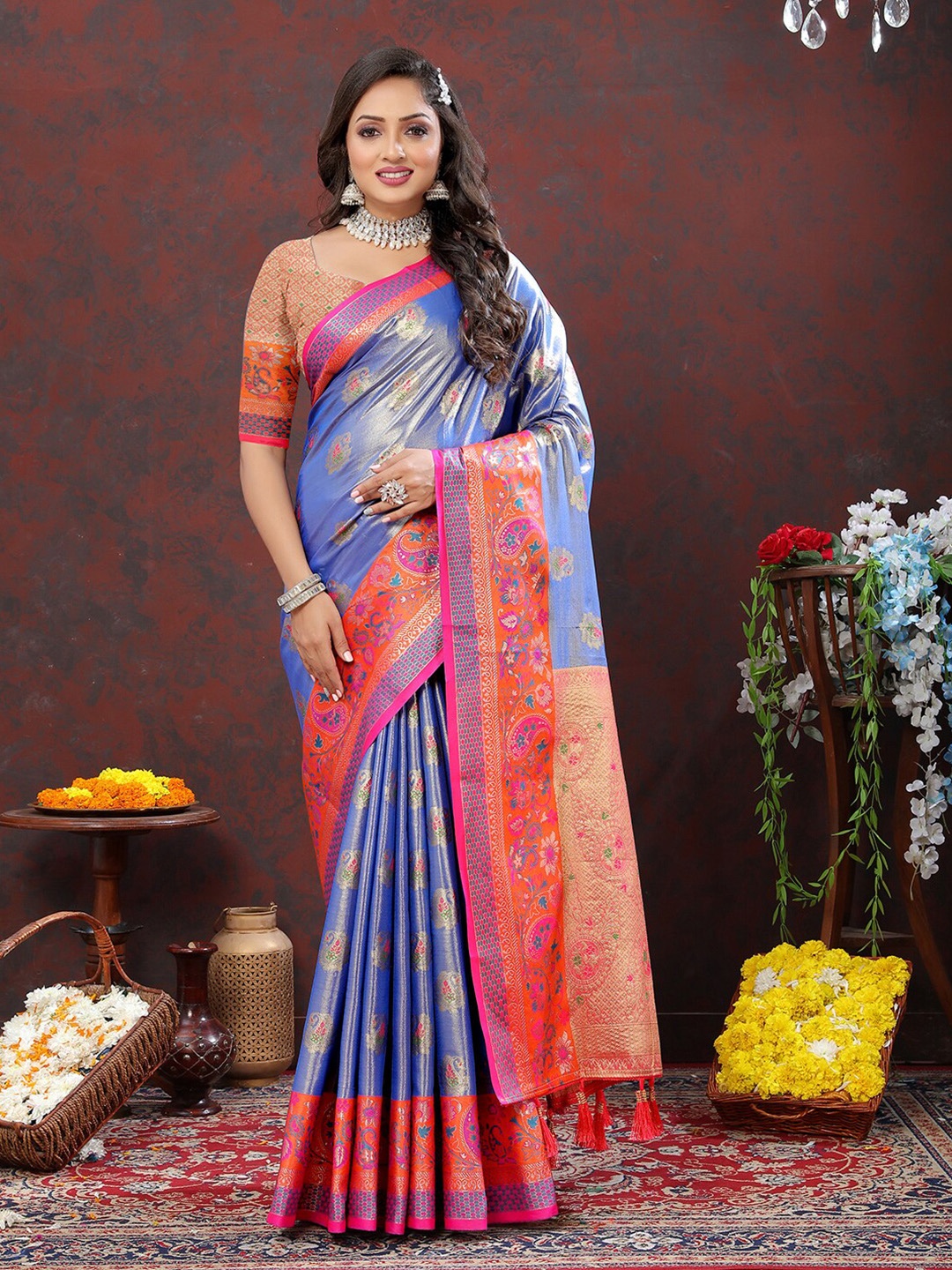 

Mitera Turquoise Blue & Orange Ethnic Motifs Woven Design Zari Kanjeevaram Saree