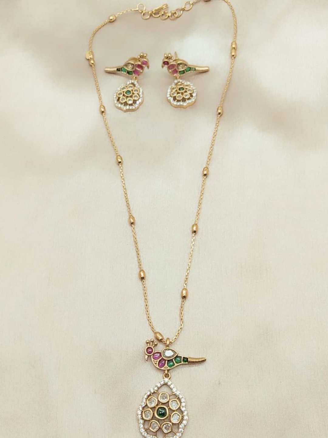 

Adc fashions Gold-Plated Artificial Stones Studded Necklace With Earrings Set, White