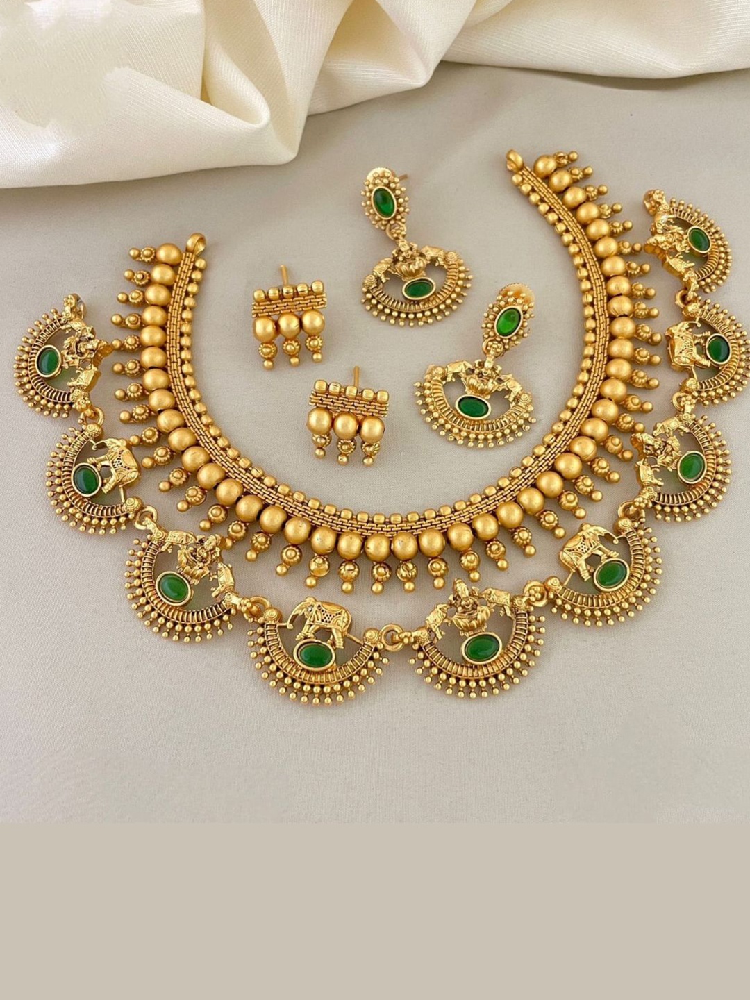 

Adc fashions Gold-Plated Artificial Stones Studded Temple Necklace With 2 Pairs Earrings, Green