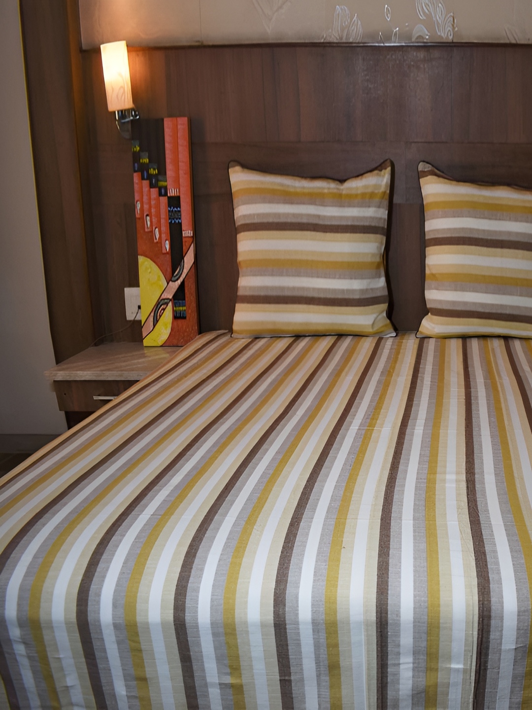 

Aura Yellow & White Striped 120 TC King Bedsheet with 2 Pillow Covers