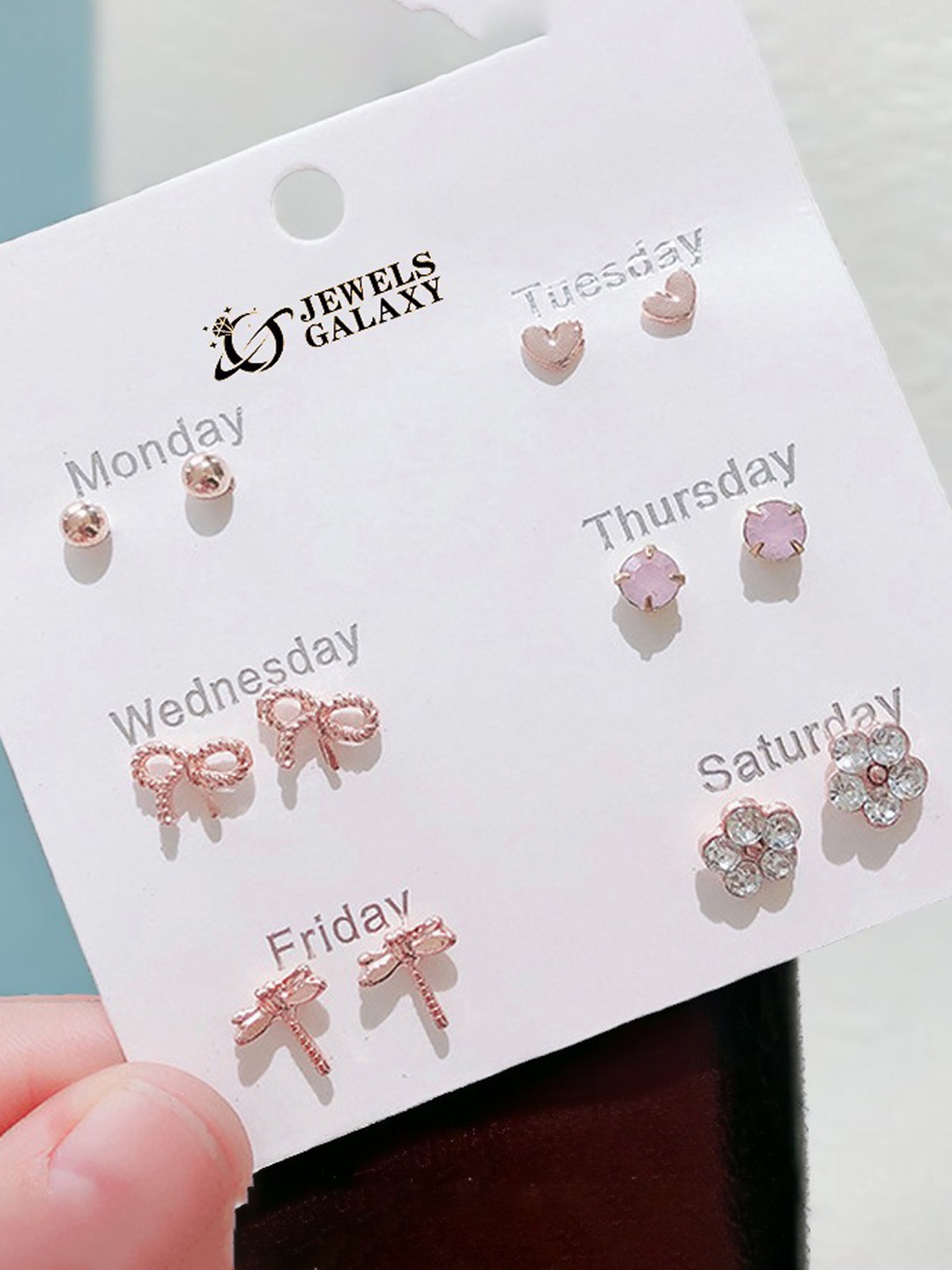 

Jewels Galaxy Contemporary Studs Earrings, Rose gold