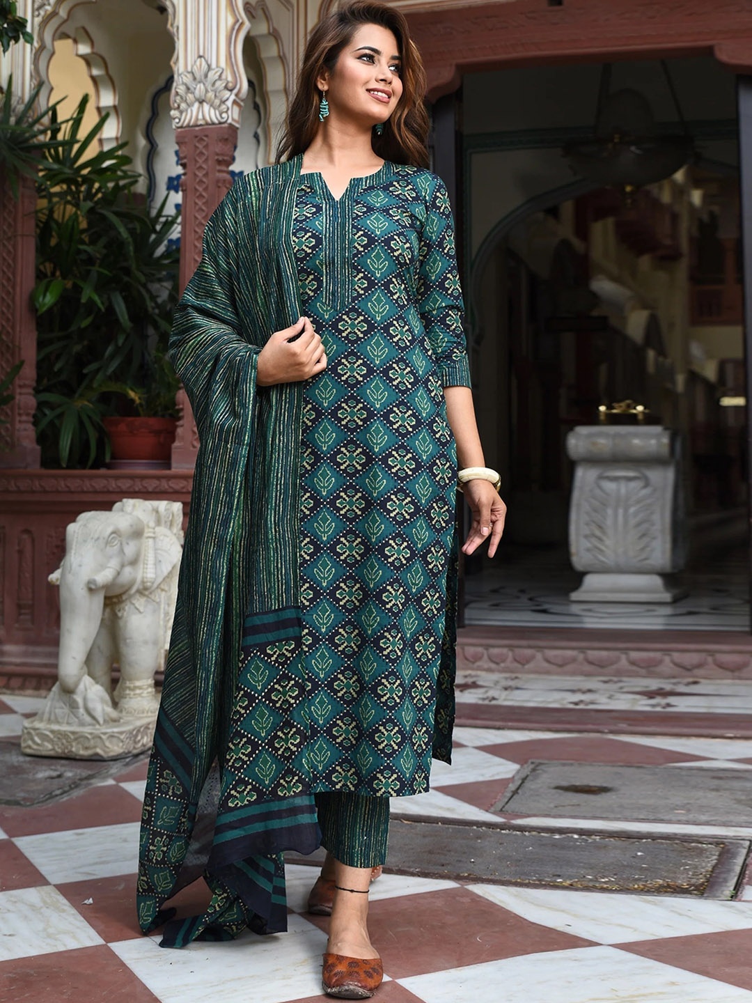 

KALINI Floral Printed Regular Straight Kurta With Trousers & Dupatta, Green