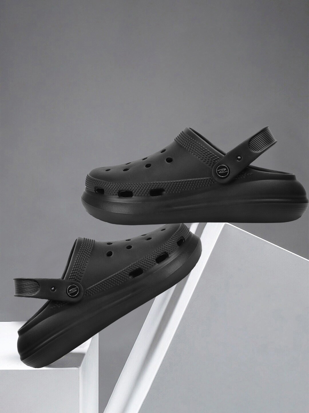 

The Roadster Lifestyle Co. Women Black Clogs