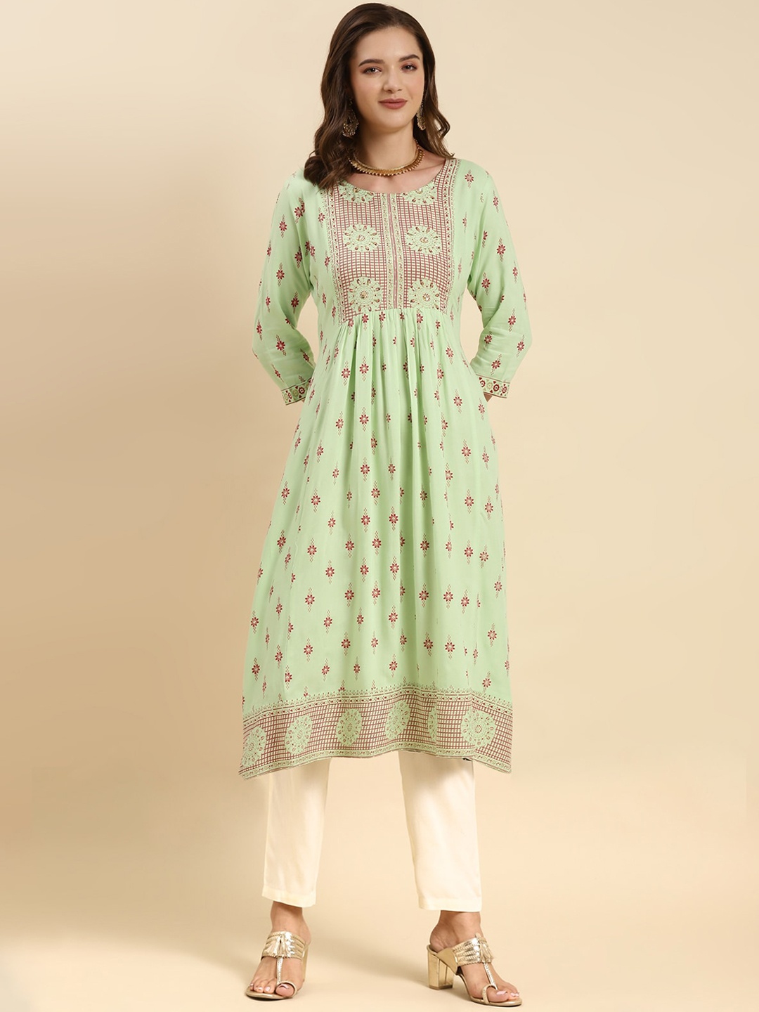 

Rangita Women Floral Printed Regular Kurta with Trousers, Green