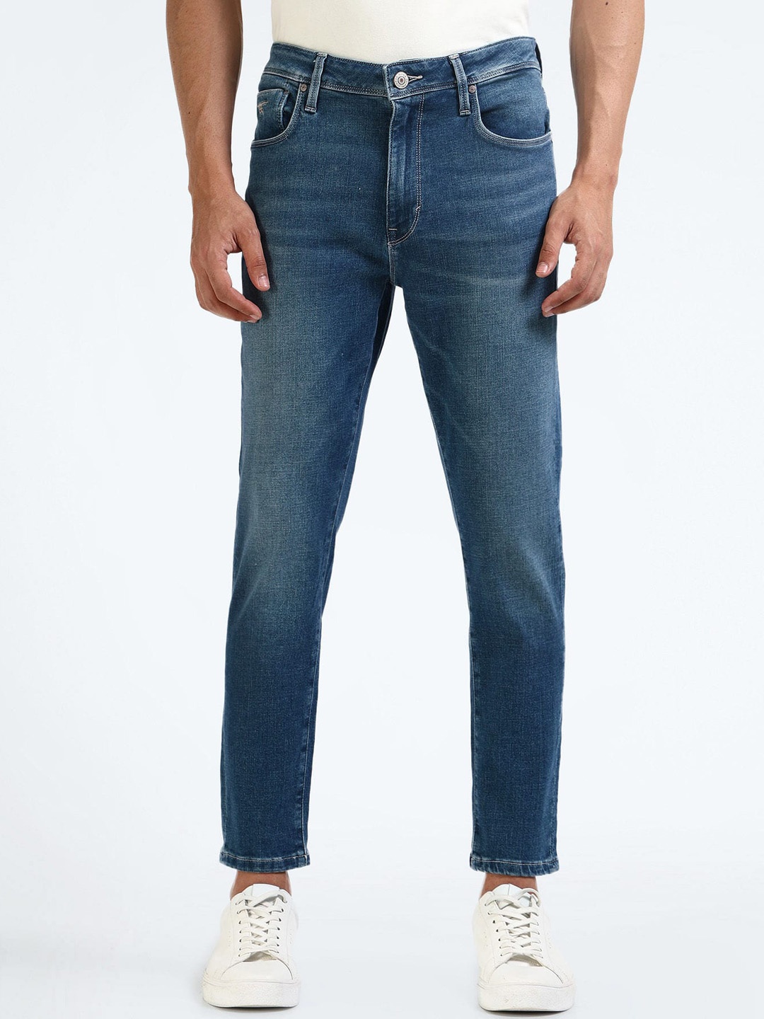 

Flying Machine Men Tapered Fit High-Rise Heavy Fade Stretchable Jeans, Blue