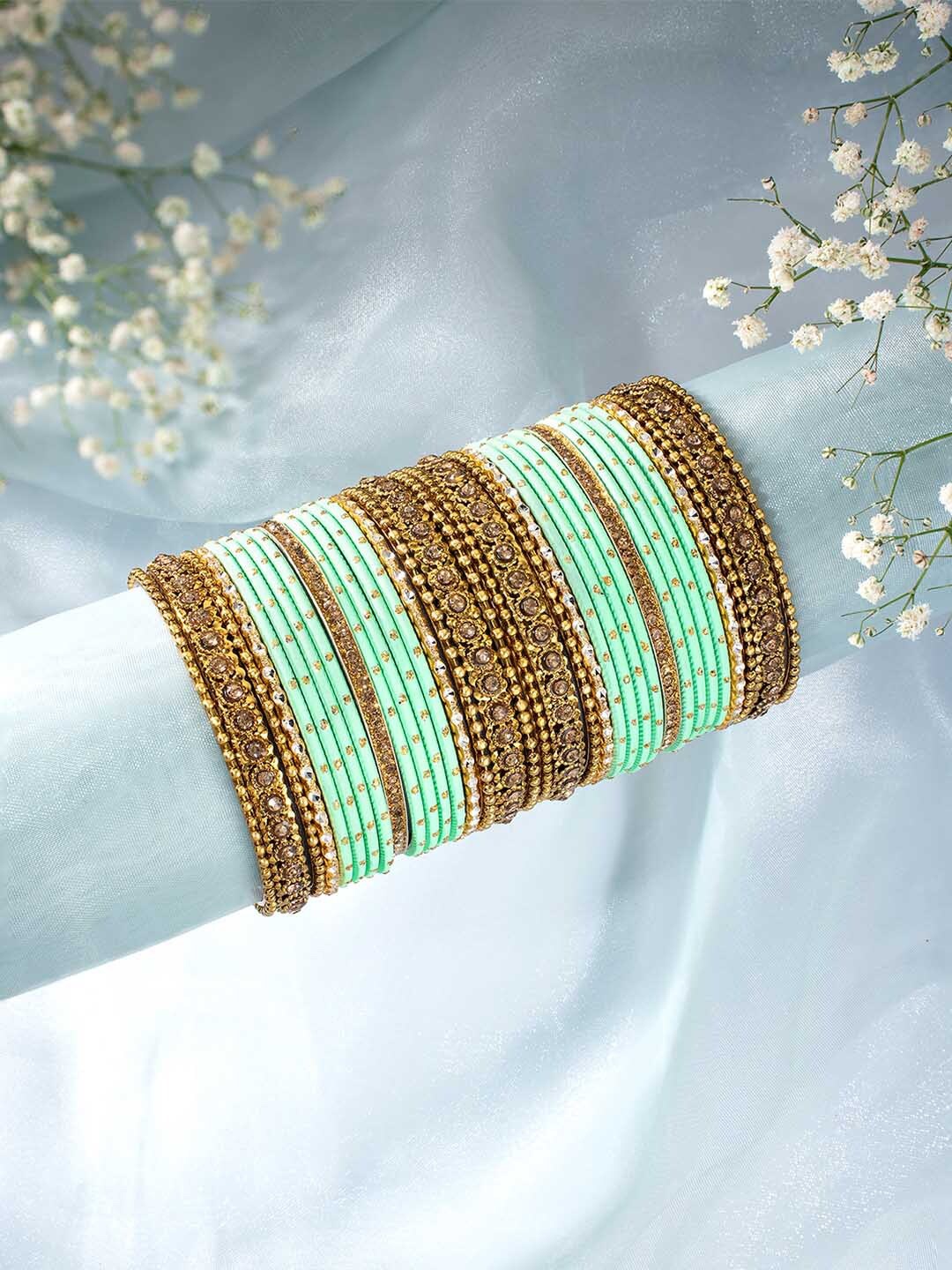 

Peora Set Of 34 Gold Plated Stones Studded Bangles