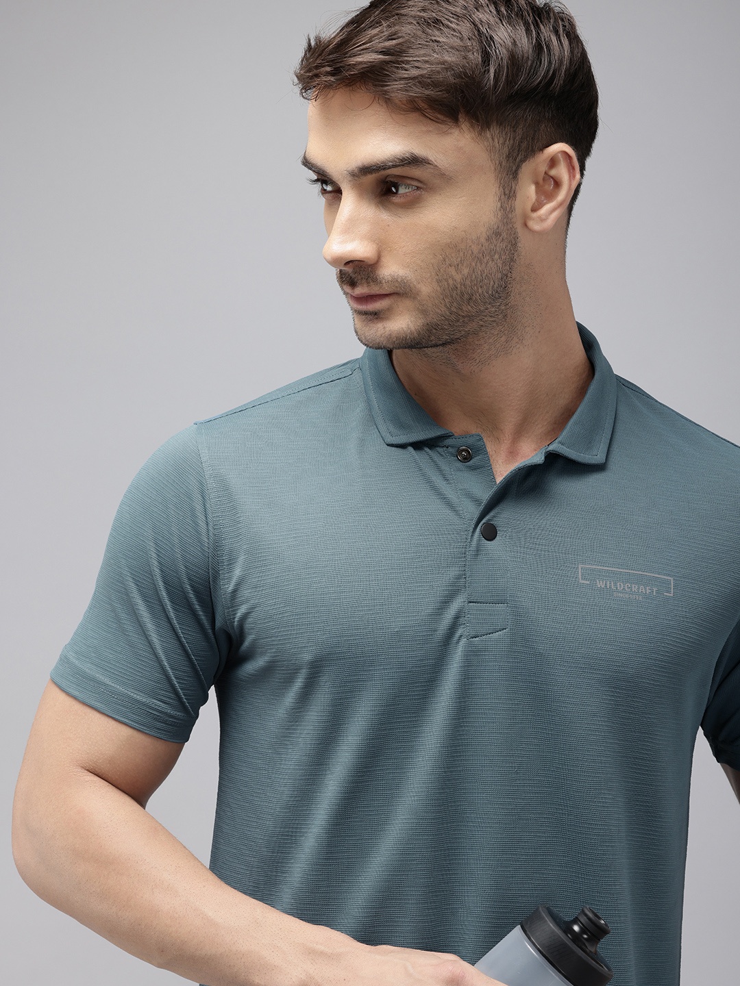 

Wildcraft Self Striped Polo Collar Sports T-shirt, Teal