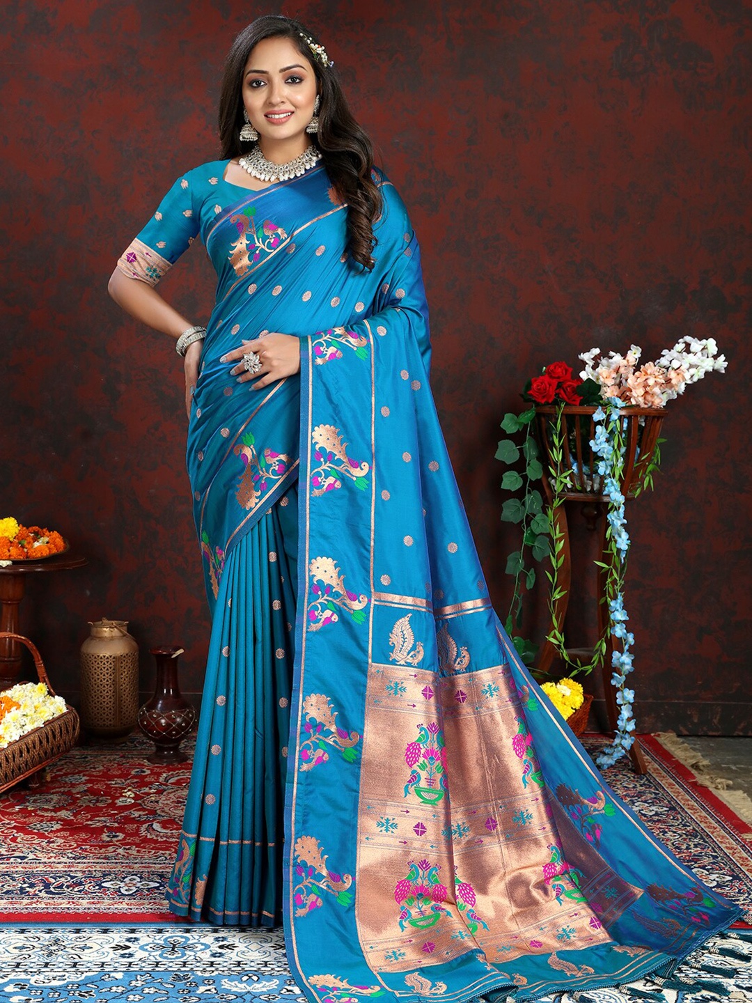 

Mitera Ethnic Motifs Woven Design Zari Paithani Saree, Turquoise blue