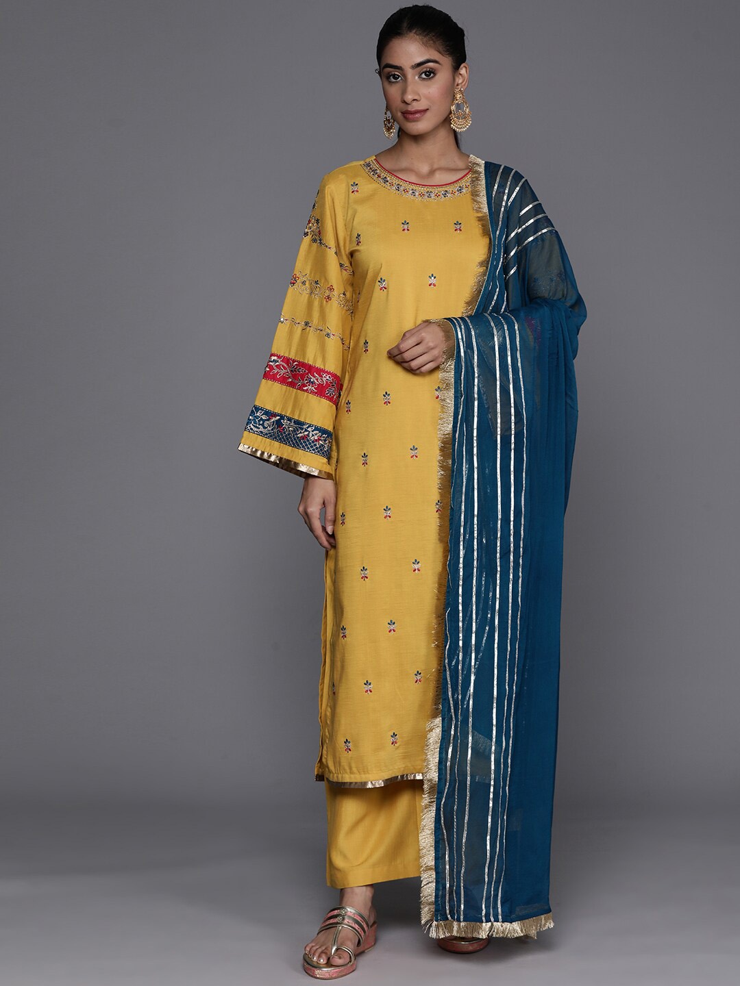 

Varanga Round Neck Ethnic Motifs Embroidered Regular Kurta with Trousers & With Dupatta, Mustard