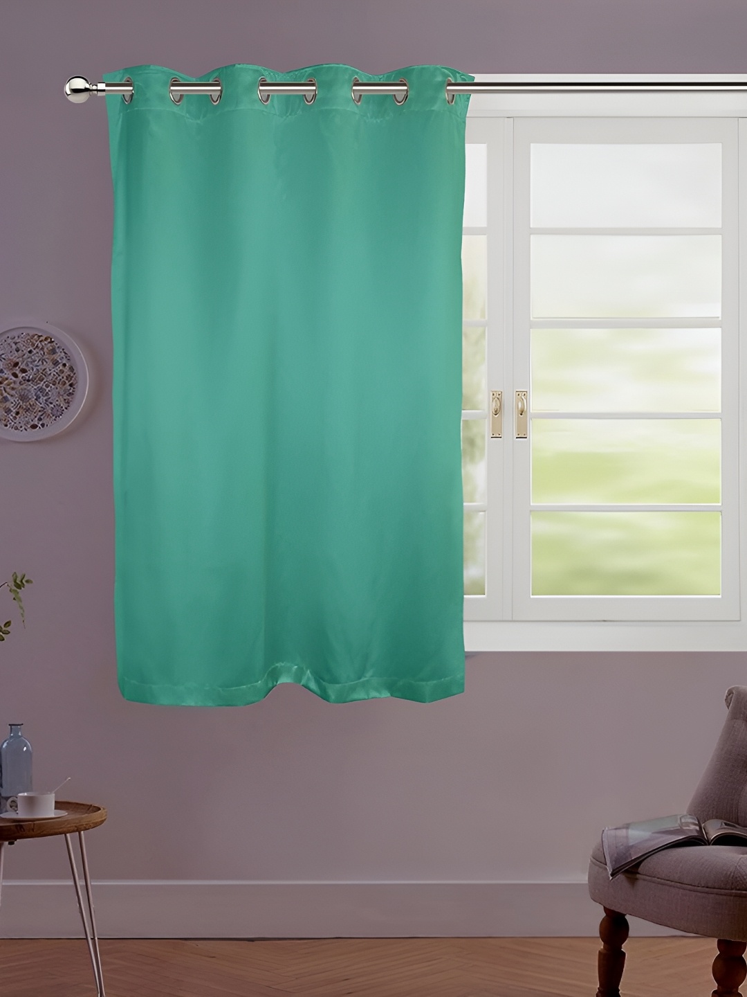 

Lushomes Green Eyelet Black Out Satin Window Curtain