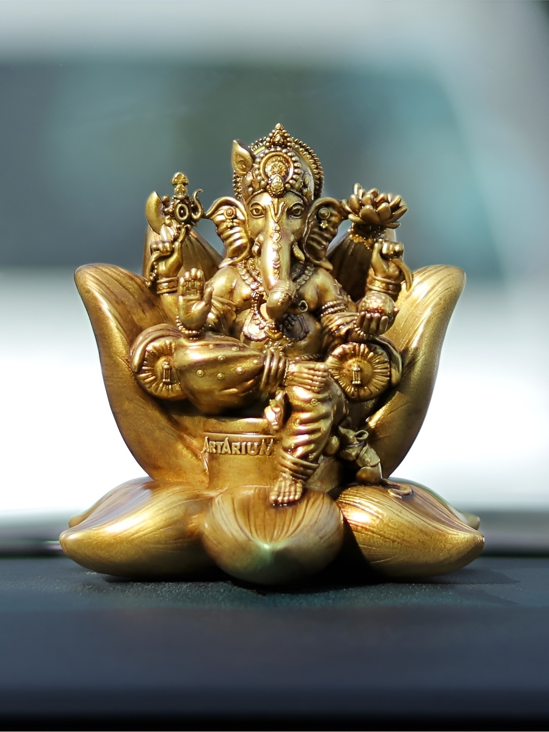 

Artarium LLP Gold-Toned Religious Figurine Showpiece