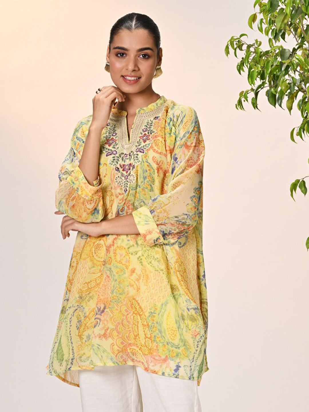 

Lakshita Floral Printed Mandarin Collar Cuffed Sleeves Thread Work Kurti, Yellow