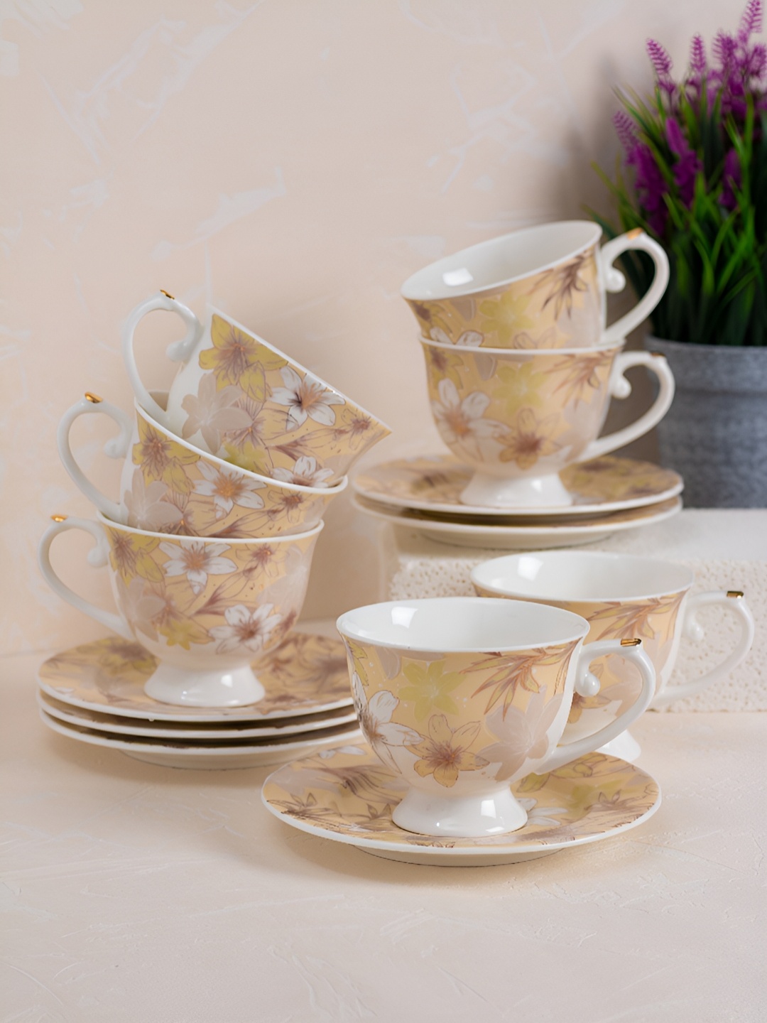 

JCPL White Printed 12 Pieces Ceramic Cup & Saucer Set -180 ml each