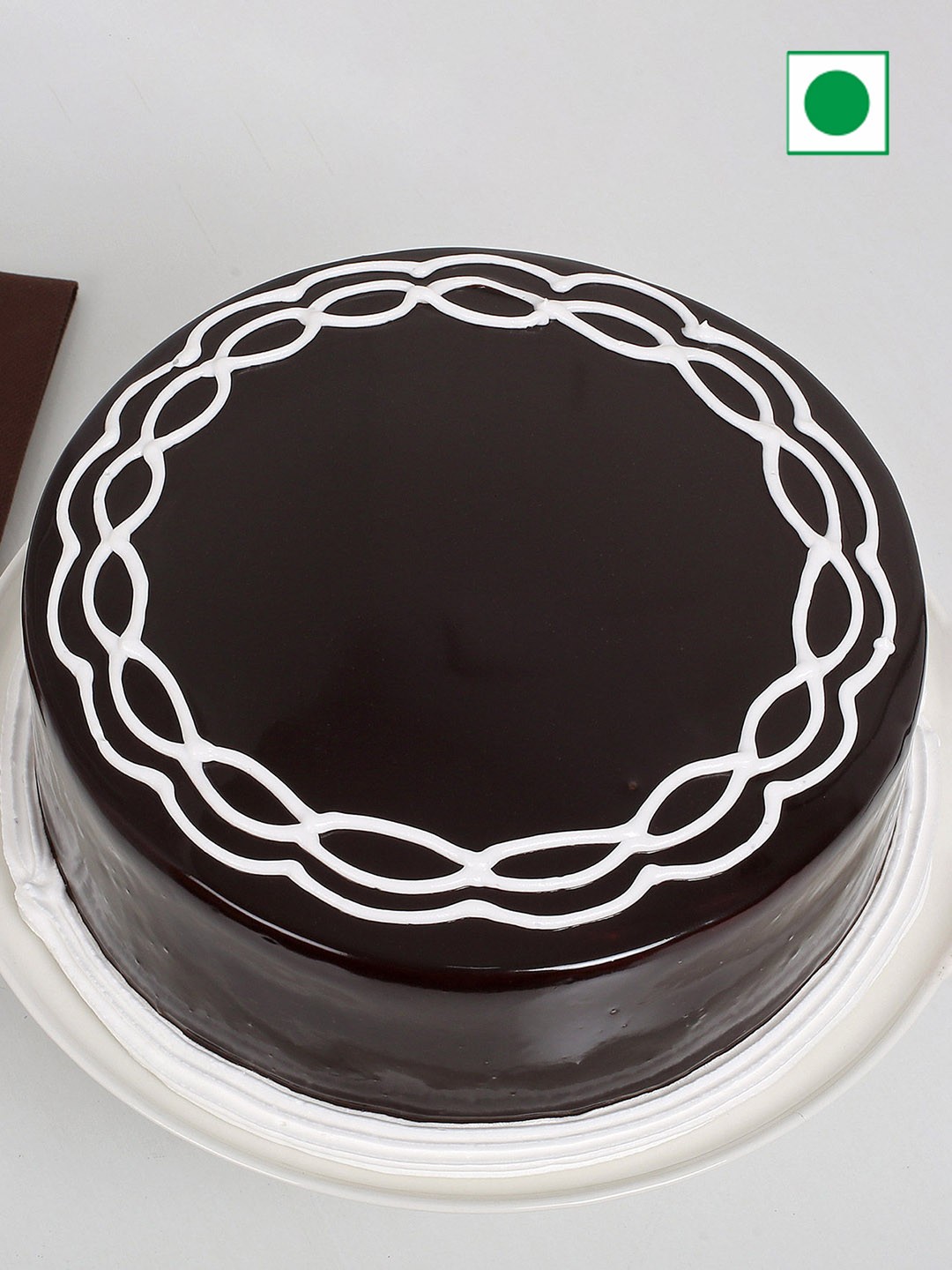 

fnp Chocolate Flavor Eggless Round Cake- 500 gms, Brown