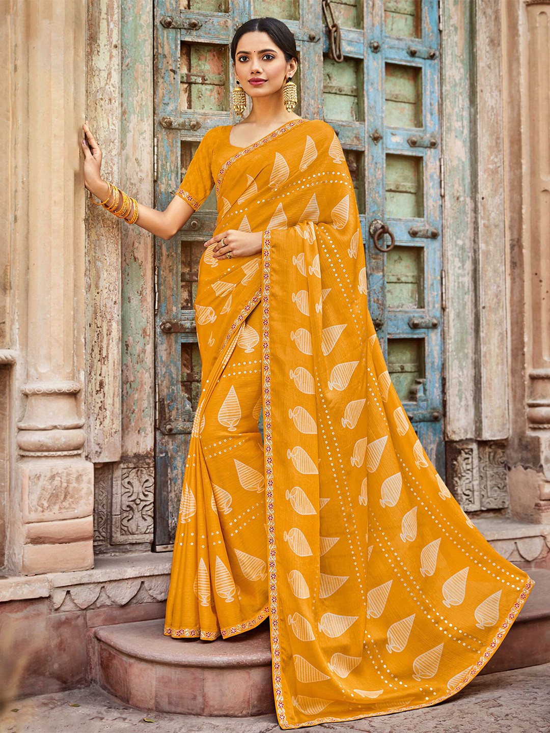 

Laxmipati Ethnic Motifs Printed Embroidered Saree, Mustard