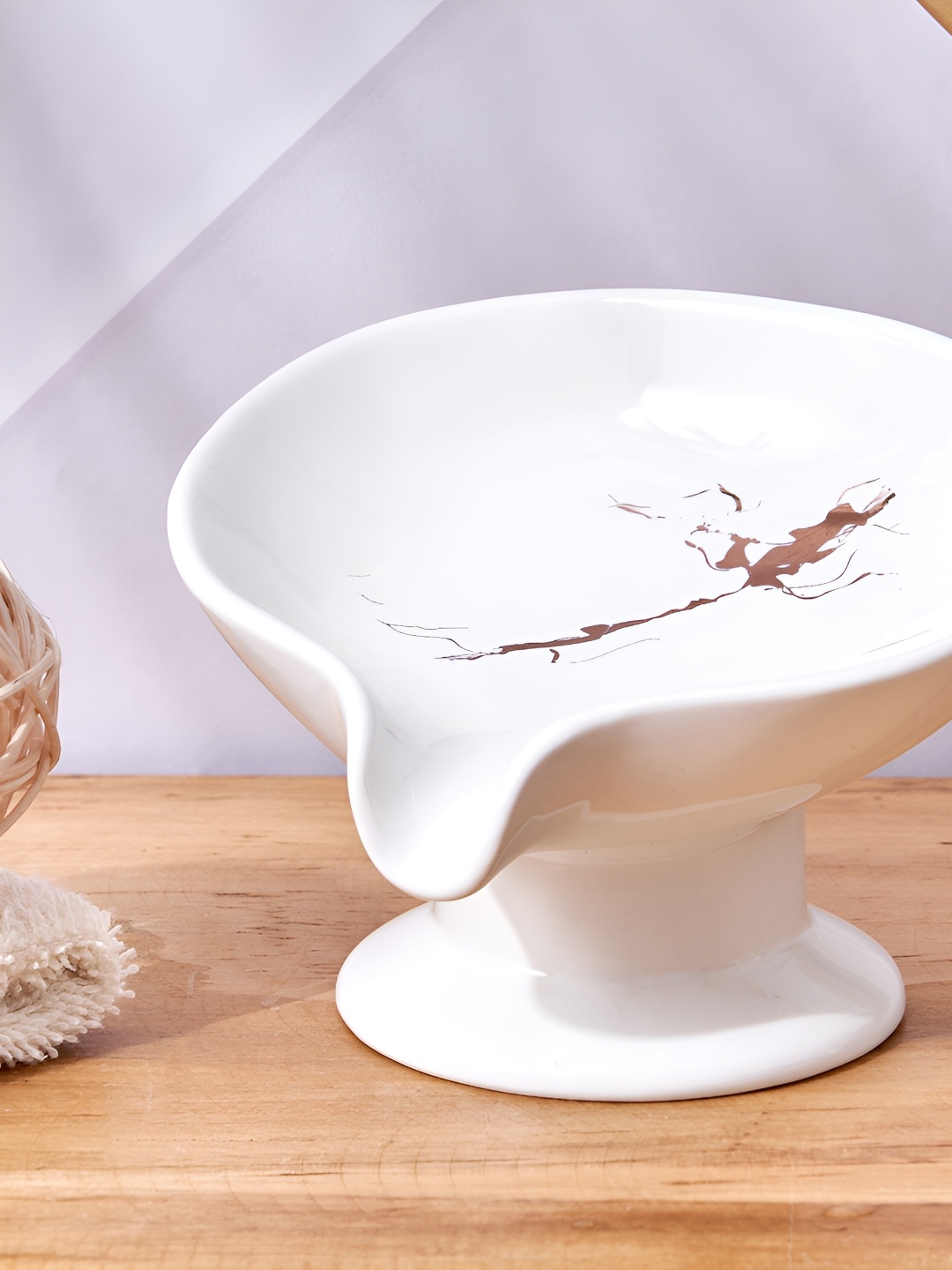 

Home Centre White & Copper-Toned Abstract Ceramic Soap Dish