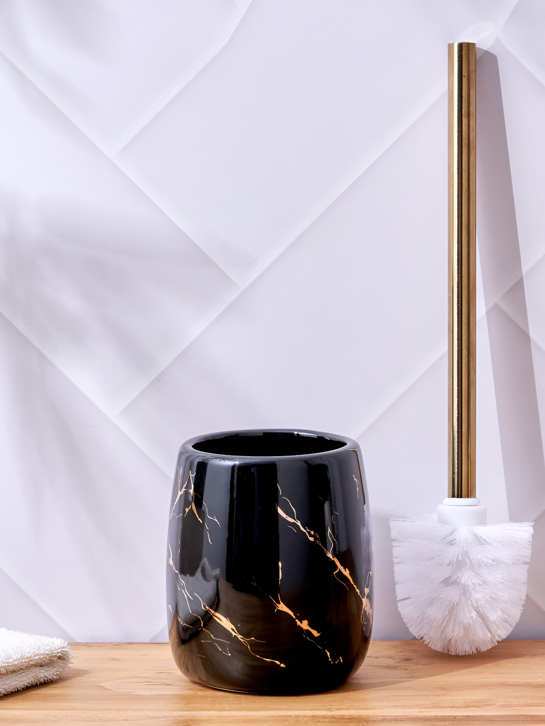 

Home Centre Black & Gold-Toned Abstract Ceramic Toilet Brush Holder