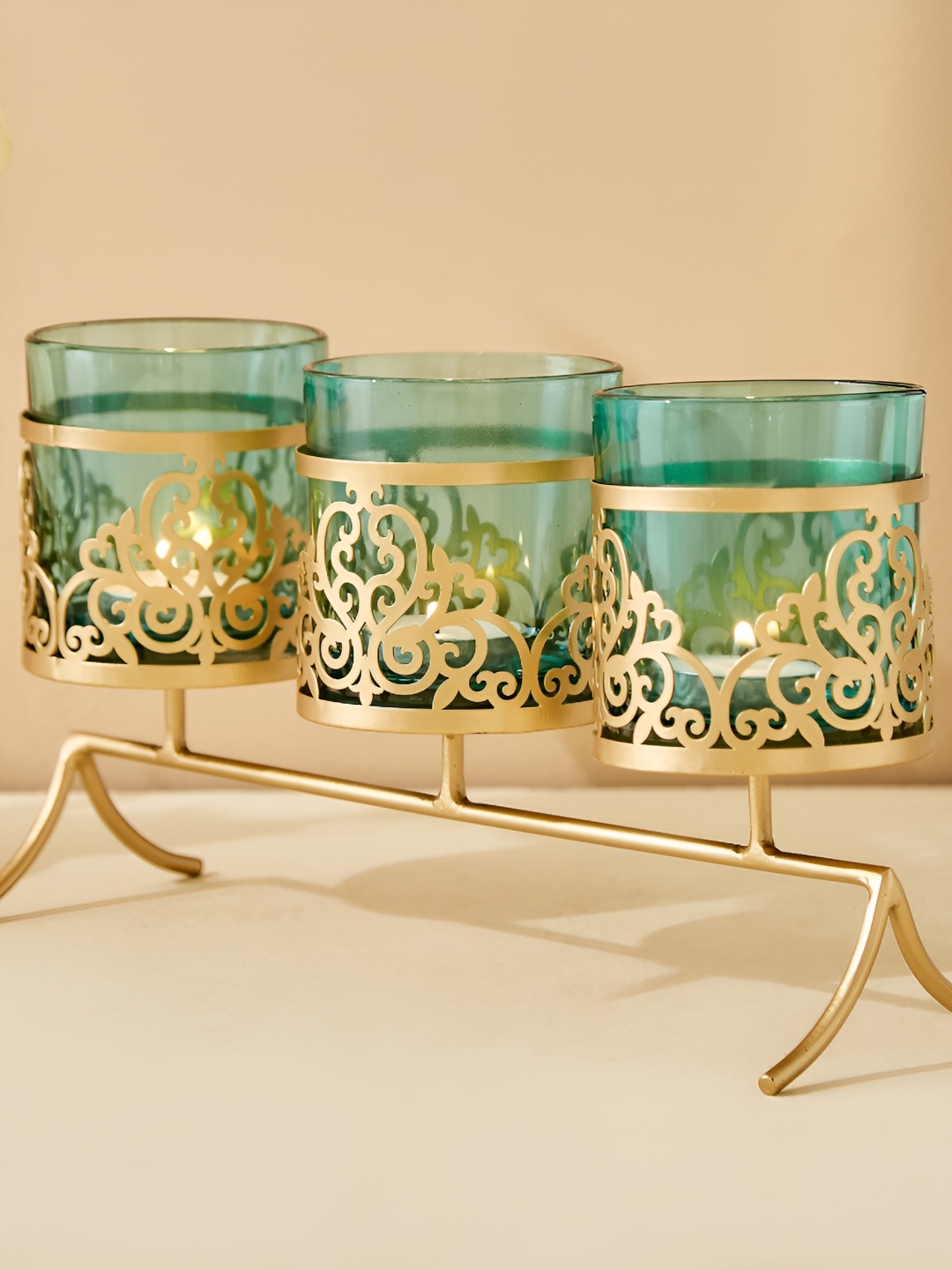 

Home Centre Gold-Toned Glass Multi T-Light Candle Holder