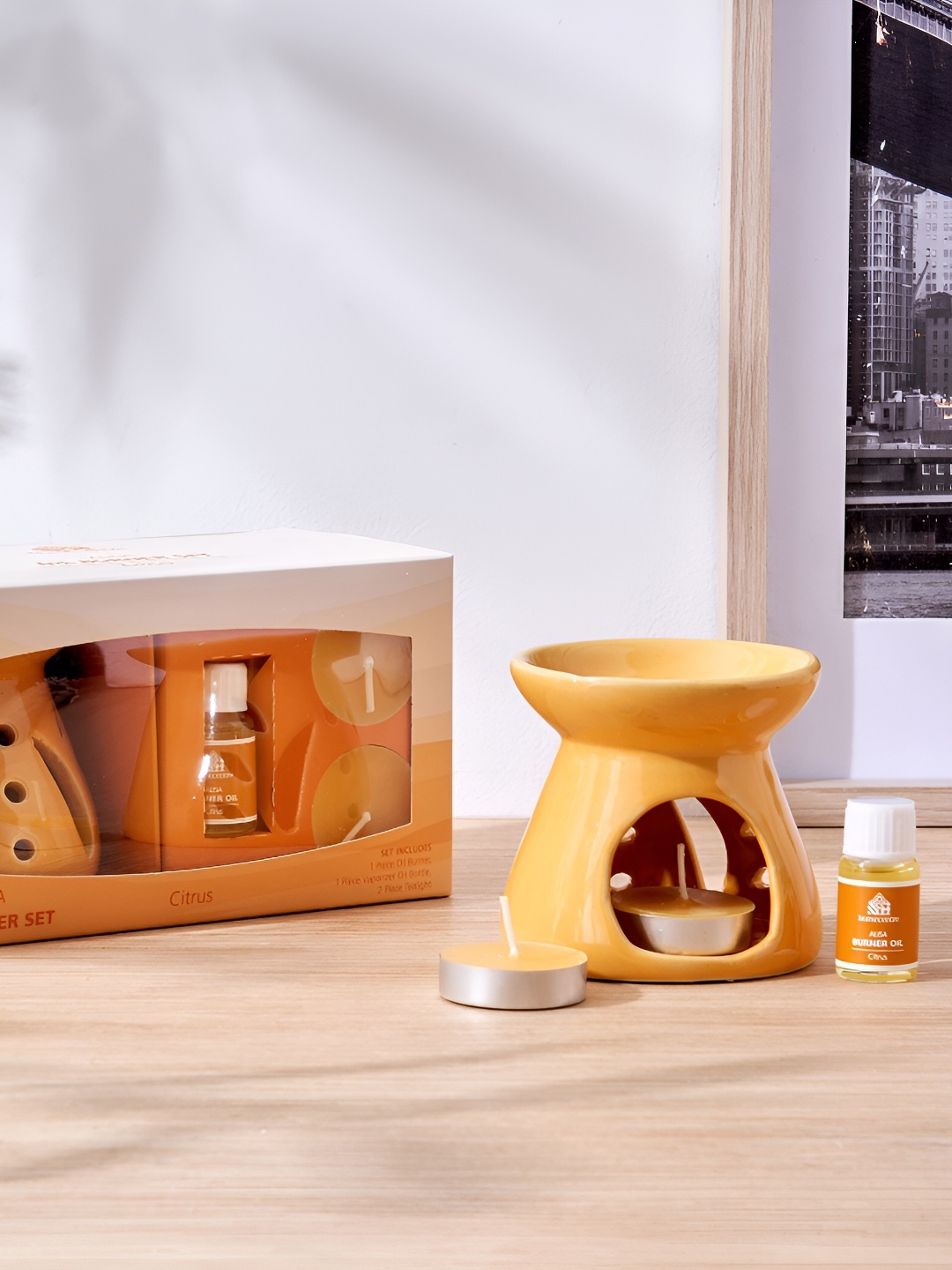 

Home Centre 4 Pieces Yellow Citrus Burner Set