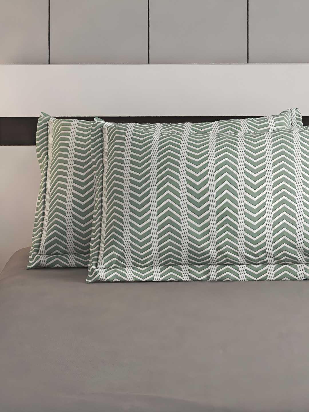 

Home Centre Rhapsody Rhube Green 2 Pieces Self Design Pure Cotton Rectangle Pillow Covers