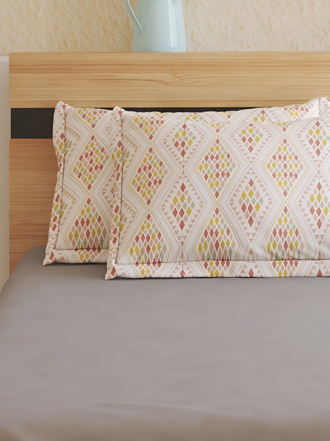 

Home Centre Rhapsody Legion Peach 2 Pieces Self Design Pure Cotton Rectangle Pillow Covers