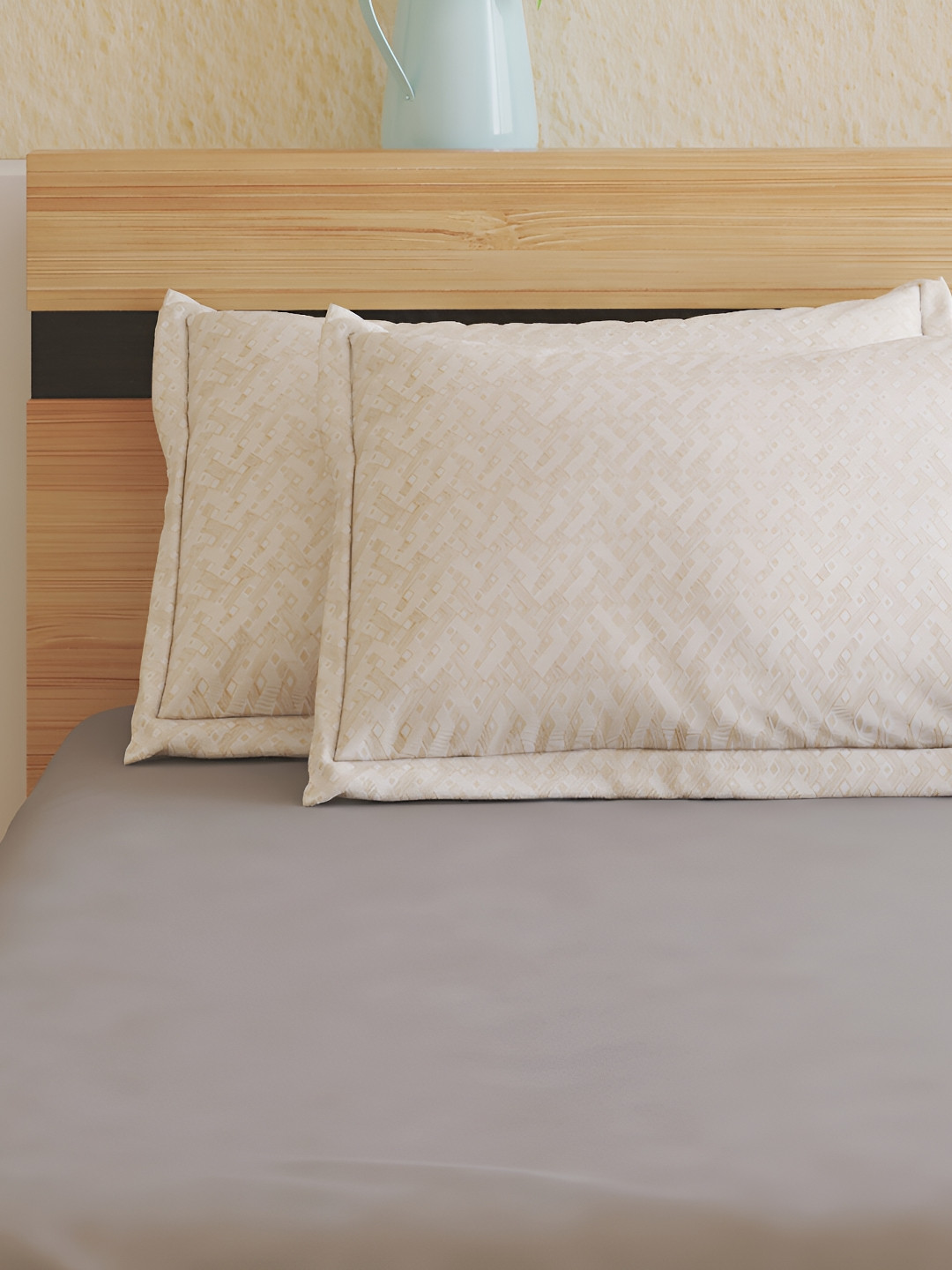 

Home Centre Rhapsody Burro Grey 2 Pieces Self Design Pure Cotton Rectangle Pillow Covers