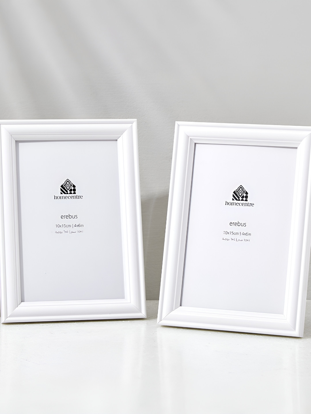 

Home Centre Sepia Lucas White 2 Pieces Wall Photo Frames
