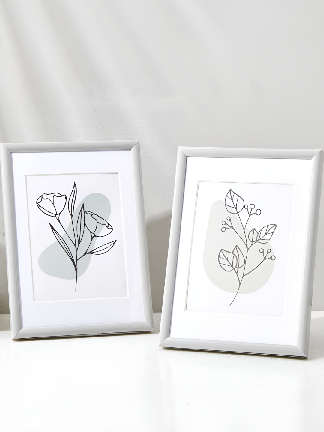 

Home Centre Corsica Snapshot Grey 2 Pieces Table Photo Frames